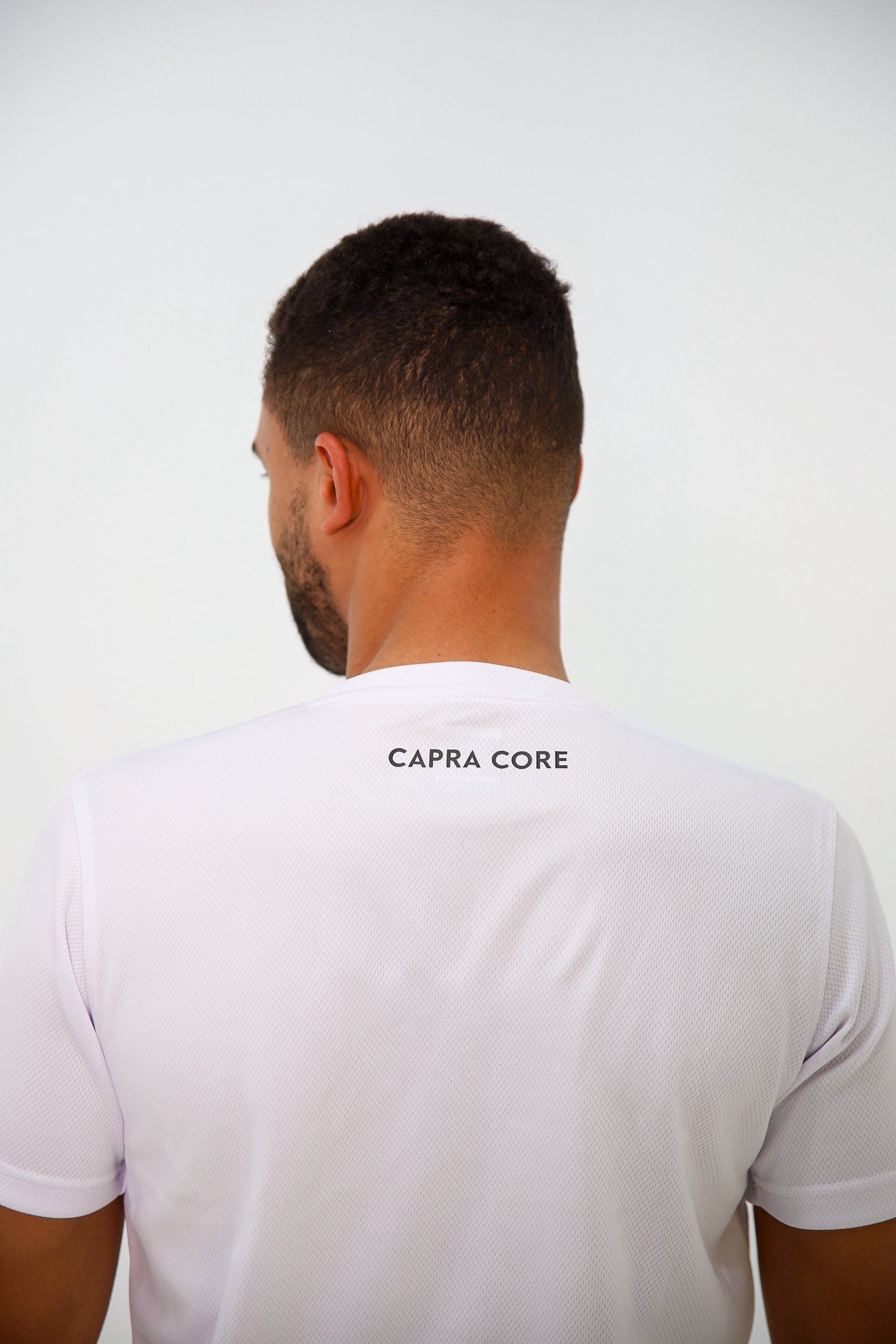 CAPRA Sport T-shirt zwart - ademende stof detail