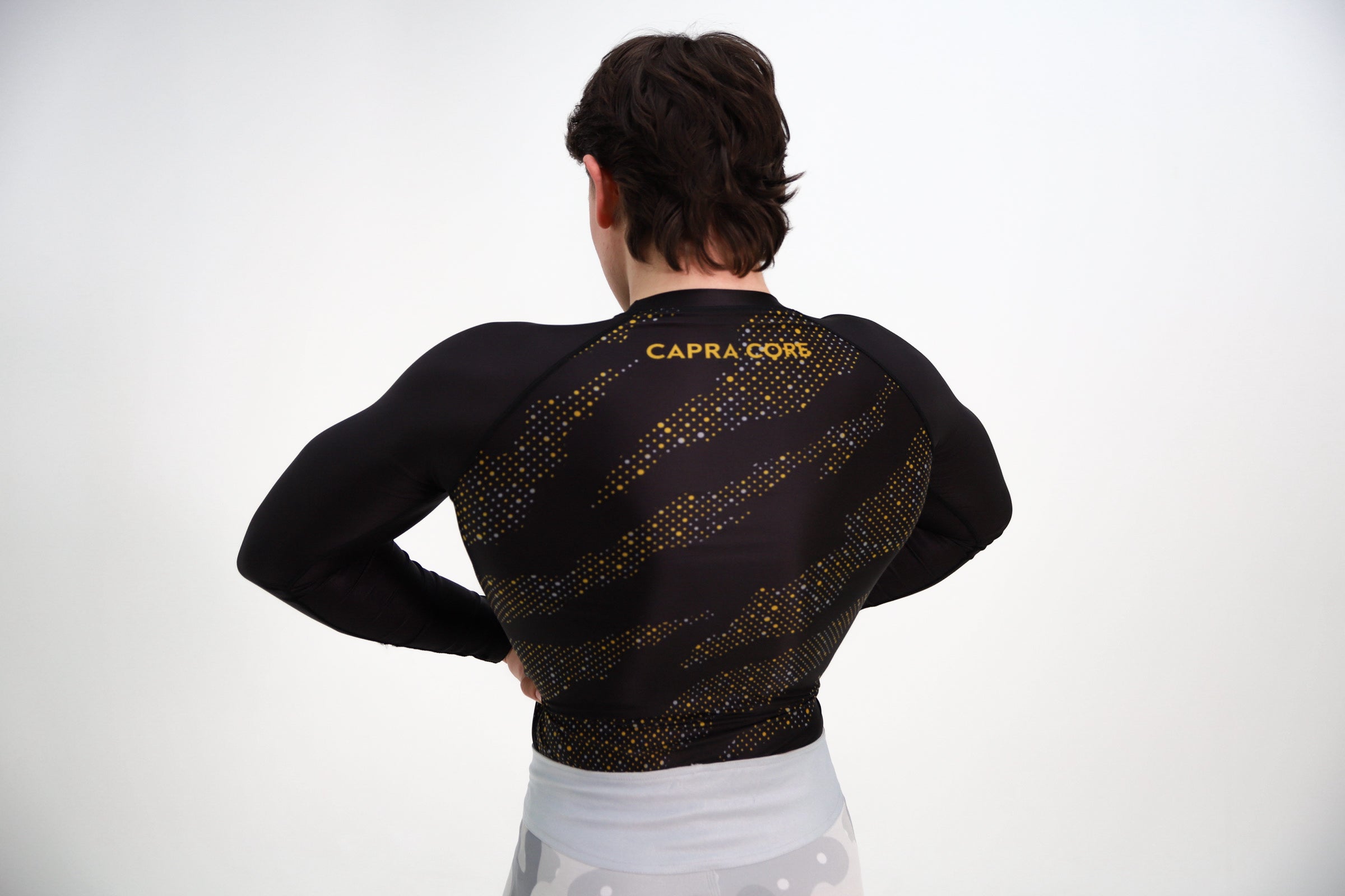 CAPRA Rashguard lange mouw gold - manchet detail