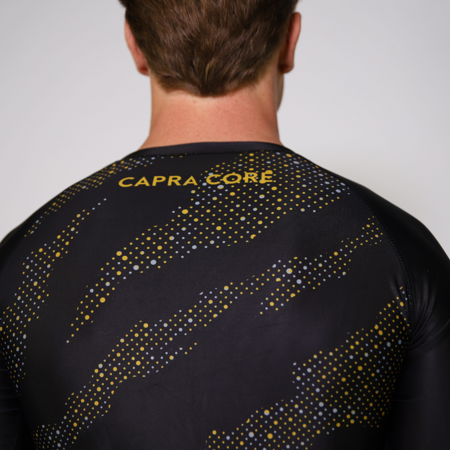 CAPRA RASHGUARD LONGSLEEVE GOUD